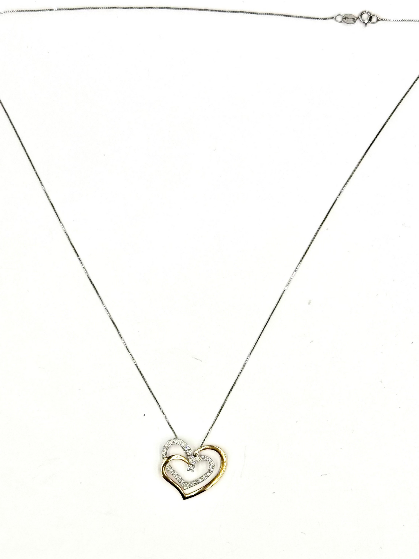 Collana d'oro bianco "Abbraccio di due Cuori"