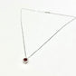 Collana d’oro bianco “incanto rosso”