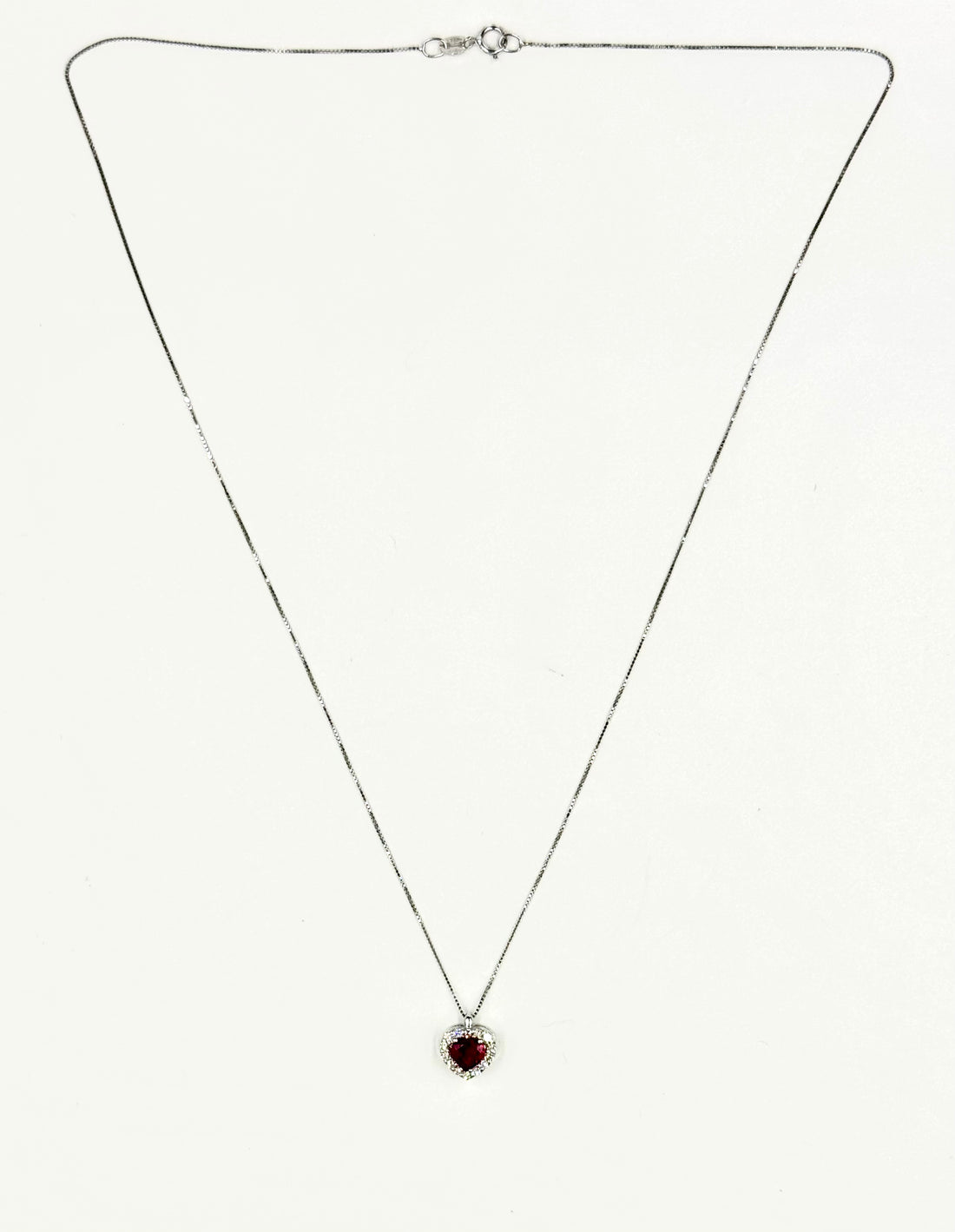 Collana d’oro bianco “incanto rosso”